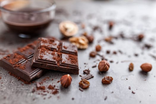 Delicious chocolate on a rustic grey background