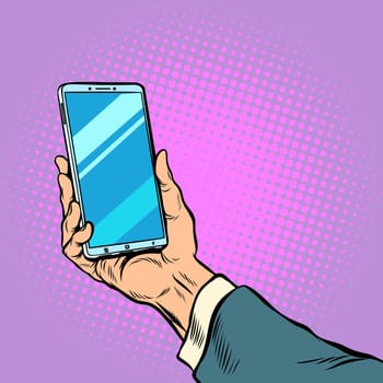 Smartphone in male hand selfie. Pop art retro vector illustration comic cartoon kitsch drawing