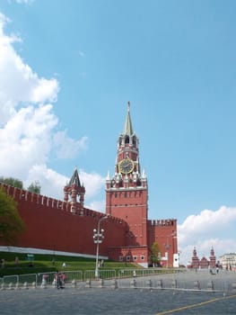 Spasskaya Tower of the Kremlin on Red Square against the blue sky. Moscow, Russia.