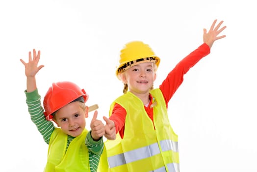 boy and girl with reflective vest and helmet in front of white background