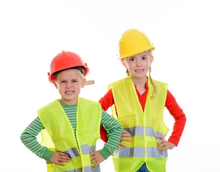 boy and girl with reflective vest and helmet in front of white background