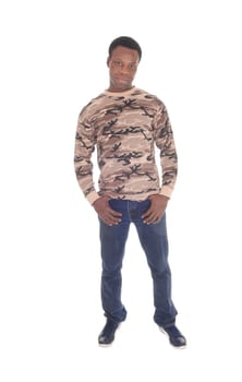 An African American man standing isolated for white background with.his hands in his pocket, looking sad, isolated for white background.