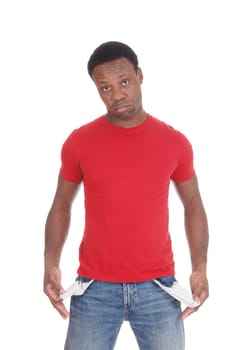 A close up image of the middle section of a black man showing his.empty pockets, he is poor, isolated for white background.
