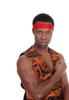 A close up image of a very serious looking African American man.standing with his fist on his chest, isolated for white background.