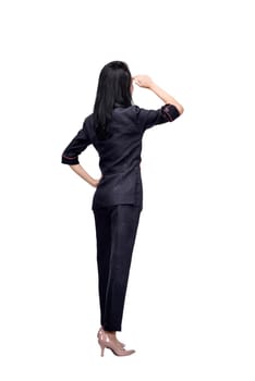Rear view of asian business woman looking up posing isolated over white background