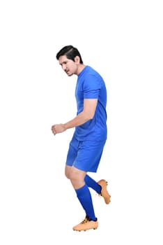 Professional asian footballer man kicking the ball posing isolated over white background