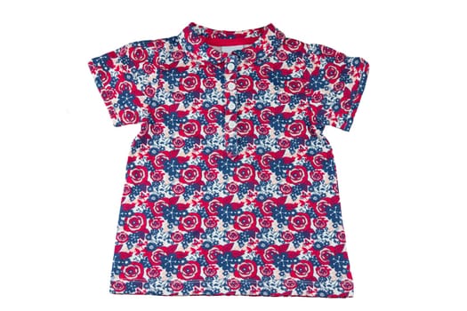 Fashionable little girl shirt with floral print. Beauty and style in childrens cloths. The shirt has bright red white roses. Concept fashion for children. Isolated on white. Closeup.
