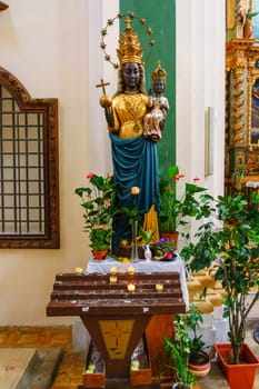 France, Annecy - May 01, 2018:Interior of the church with the magnificent statue of the black Madonna. Church of San Francesco di Salesl is the main Catholic place of worship in Annecy, in the Haute-Savoie department.