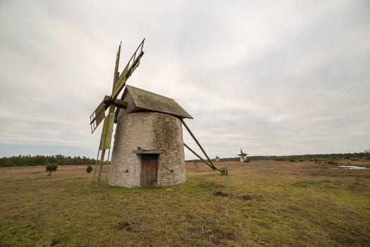Windmill on Gotland, Sweden with a cloudy sky.