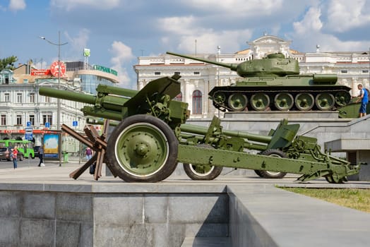 Kharkiv, Ukraine - August  05, 2014: walking in Kharkiv city, the second city in Kharkiv, Constitution square a cannon and a tank.
