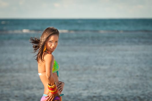 Beautiful and sexy girl posing on the beach in dominican republic