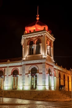 LOULE, PORTUGAL - CIRCA MAY 2018: The markethall in the old town of Loule at night. Algarve, Portugal.