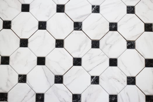Black and white checkered marble floor, stock photo