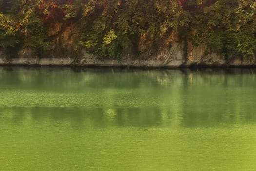 Lake with banks on the site of a former quarry for the extraction of limestone