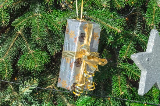 Beautiful christmas tree with gift boxes and shopping bags