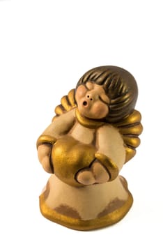 Little gold angel with a big hearth