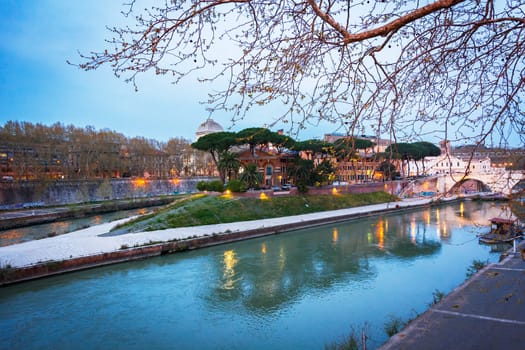 The historical Tiber island from the Garibaldi Bridge in Rome.