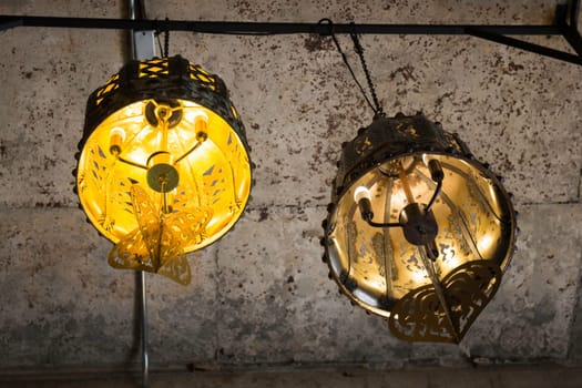 Light bulbs hanging from ceiling, stock photo
