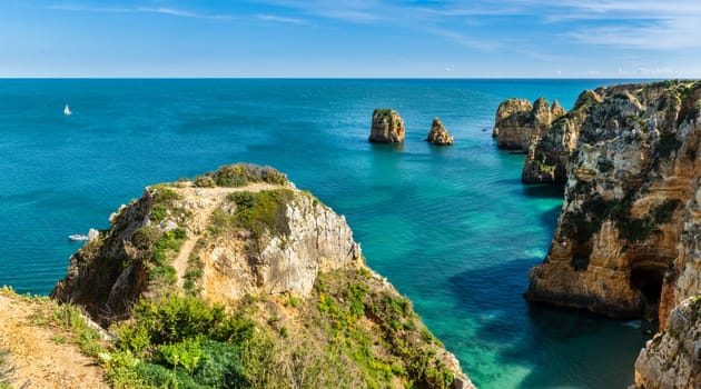 LAGOS, PORTUGAL - CIRCA MAY 2018: Cliffs view by Atlantic Ocean, Lagos, Algarve, Portugal.