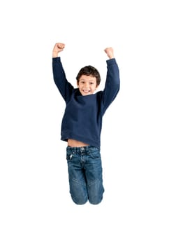 Young boyl jumping isolated in white