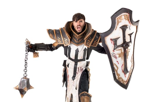 Young man cosplaying with fantasy knight costume