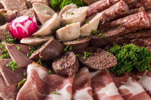 Assortment of meat delicatessen on a plate