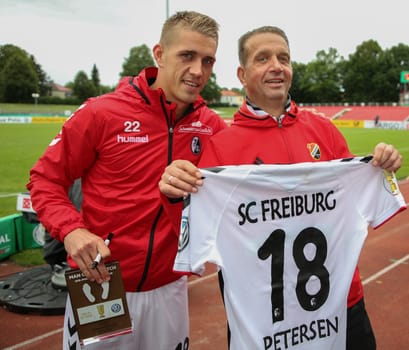 Nils Petersen ( SC Freiburg) with father Andreas Petersen (coach Germania Halberstadt) at the DFB Cup game 2017/18 VfB Germania Halberstadt - SC Freiburg on 12.08.2017