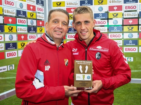 Nils Petersen ( SC Freiburg) with father Andreas Petersen (coach Germania Halberstadt) at the DFB Cup game 2017/18 VfB Germania Halberstadt - SC Freiburg on 12.08.2017