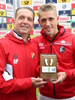Nils Petersen ( SC Freiburg) with father Andreas Petersen (coach Germania Halberstadt) at the DFB Cup game 2017/18 VfB Germania Halberstadt - SC Freiburg on 12.08.2017