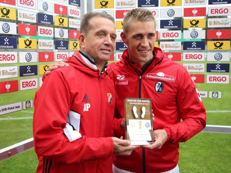 Nils Petersen ( SC Freiburg) with father Andreas Petersen (coach Germania Halberstadt) at the DFB Cup game 2017/18 VfB Germania Halberstadt - SC Freiburg on 12.08.2017
