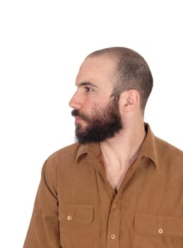A portrait image of a young man in a brown shirt with short hair and.beard and mustache looking away, isolated for white background.