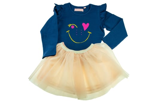 Childrens blue sweater with long sleeves and a summer skirt isolated on white. Fashion for children.