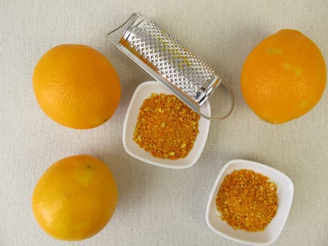 Orange abrasion of organic oranges and a grater