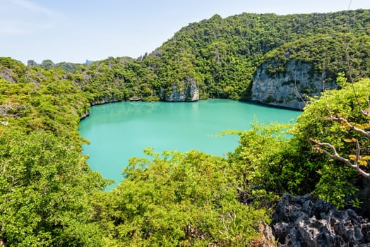 Thale Nai or Blue Lagoon (Emerald Lake) High angle view beautiful nature landscape green sea in the middle of mountain at Koh Mae Ko island viewpoint in Mu Ko Ang Thong National Park, Surat Thani, Thailand
