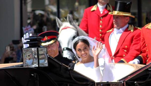 Prince Harry & Meghan Markle wedding, Windsor, Uk - 19/5/2018: Prince Harry and Meghan Markle wedding procession through streets of Windsor then back the Windsor Castle waving to crowd
