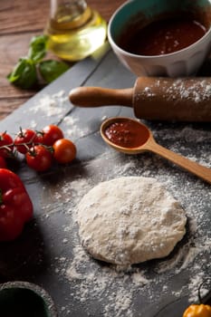 Homemade italian pizza preparation