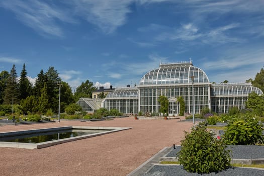 HELSINKI, FINLAND - JULY 10, 2017: Kaisaniemi botanic garden and its greenhouse in Helsinki Finland.