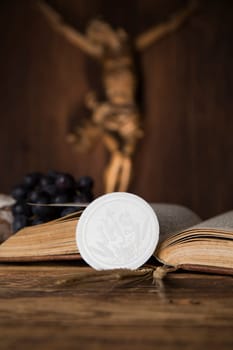 Eucharist symbol of bread and wine, chalice and host, First communion background