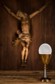 Eucharist symbol of bread and wine, chalice and host, First communion background