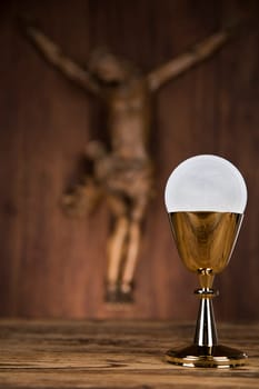 Eucharist symbol of bread and wine, chalice and host, First communion background