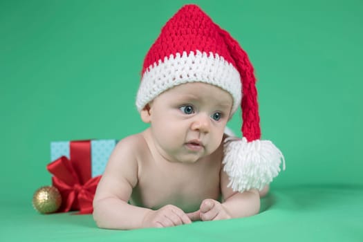 Little cute baby girl with santa hat
