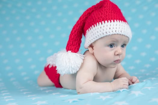 Little cute baby girl with santa hat