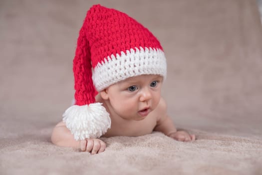 Little cute baby girl with santa hat