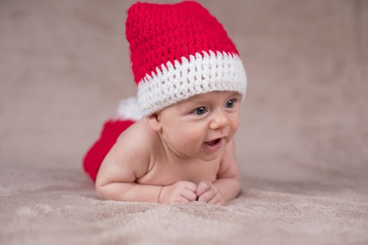 Little cute baby girl with santa hat
