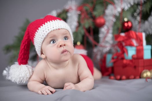 Little cute baby girl with santa hat
