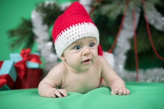 Little cute baby girl with santa hat