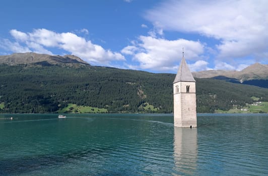 Reschensee with church on the Reschen Pass in the Alps
