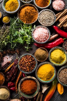 Spices over wooden background