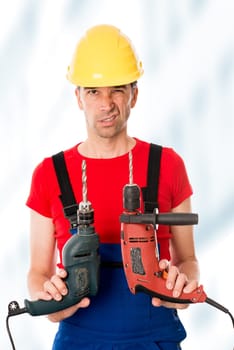 wild man with helmet and two drilling machine