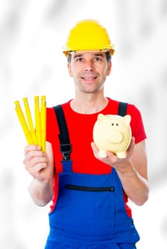 worker with yardstick and piggy bank